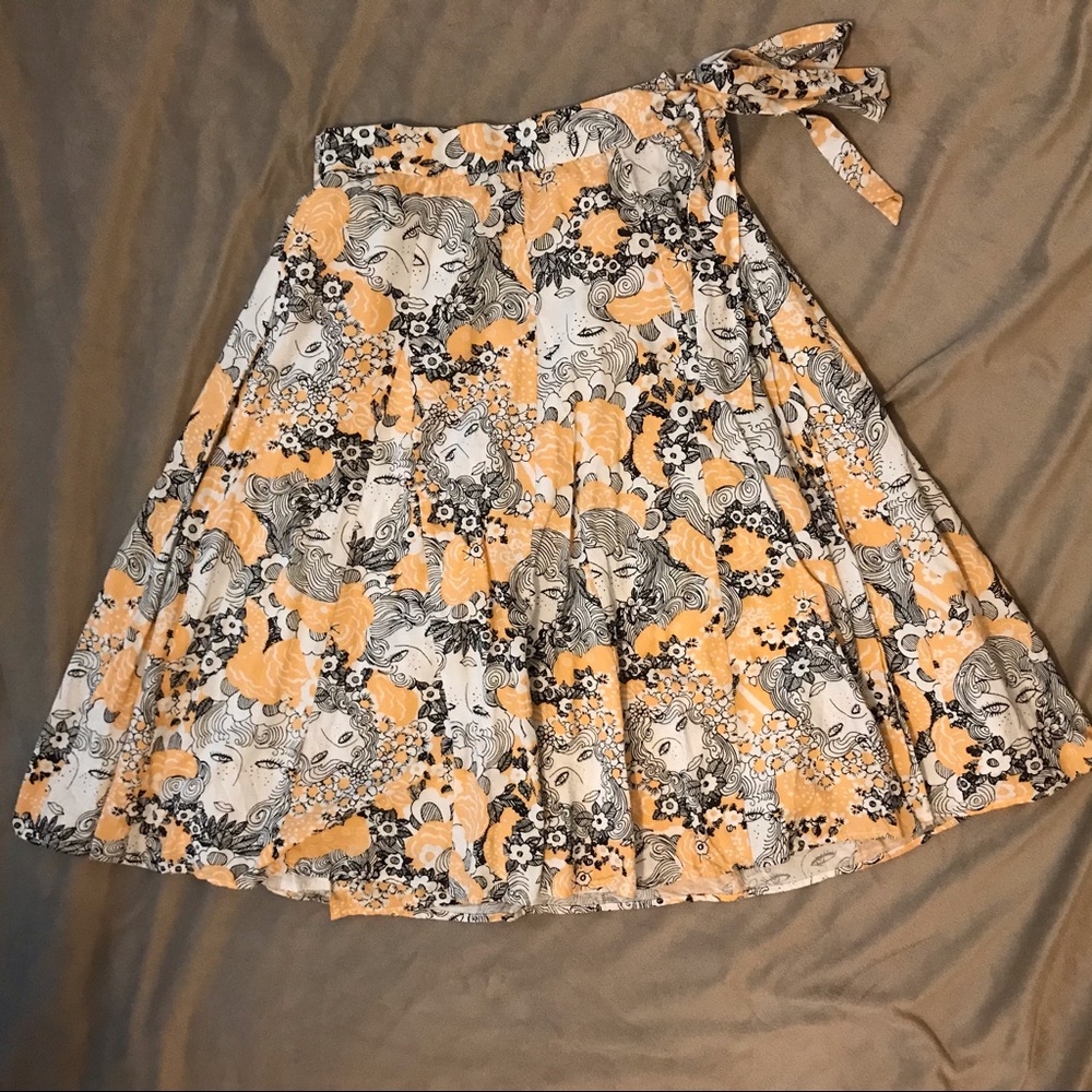 ModCloth A line knee length skirt.